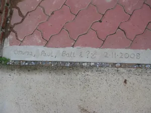 This was taken just after we completed the rooms at Chon Gao.  We wanted to set something in stone, so to speak, so Onuma, myself and Bon scrawled in the concrete! We didn't know her name at the time but my daughter's name is the '?' shown!